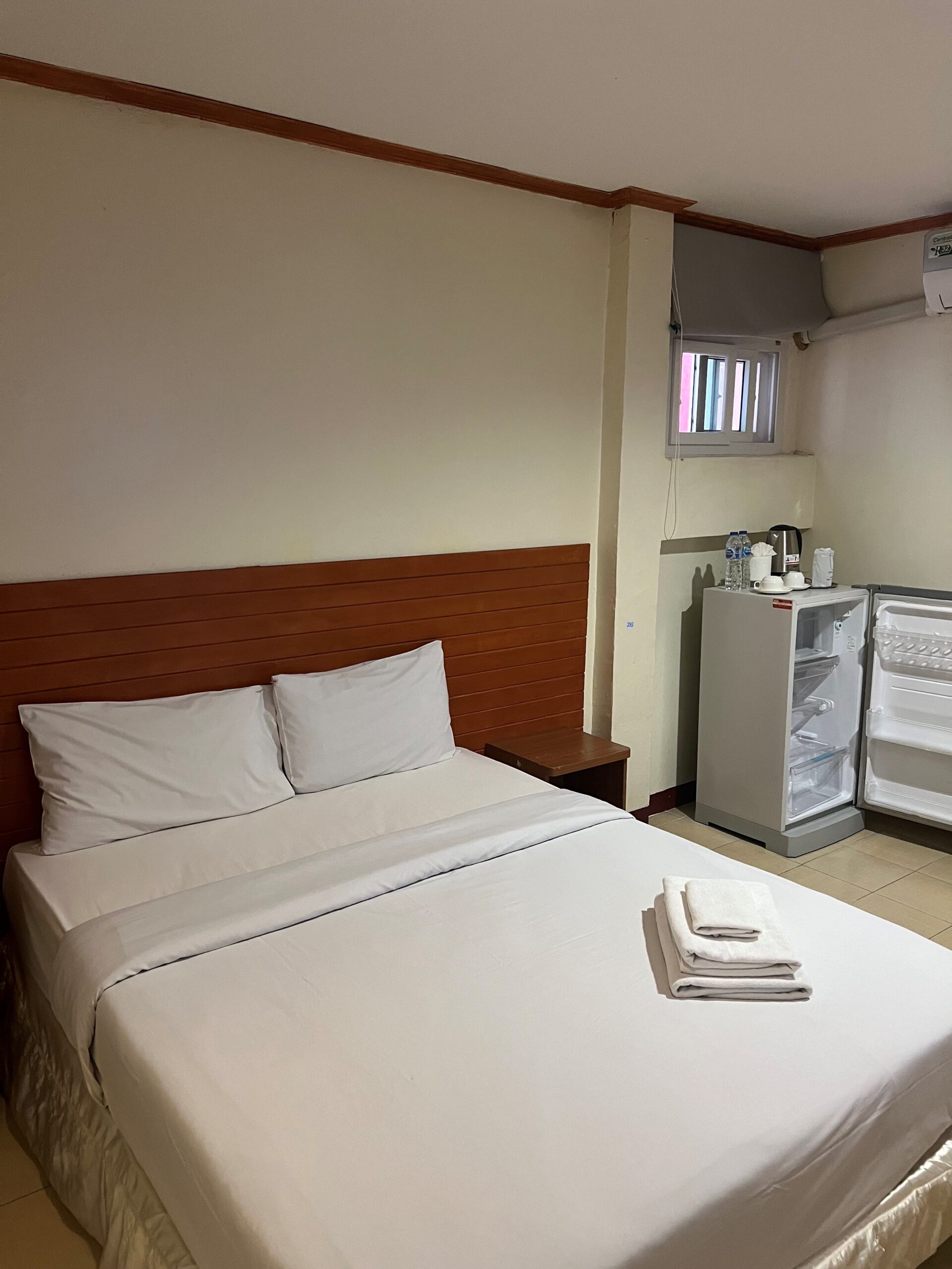 Picture of a typical Full-sized bed which comes in our standard rooms.