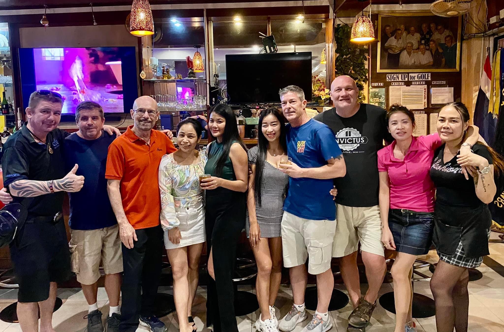 Group of golfers e3njoying an after-game drink at Lewinski's